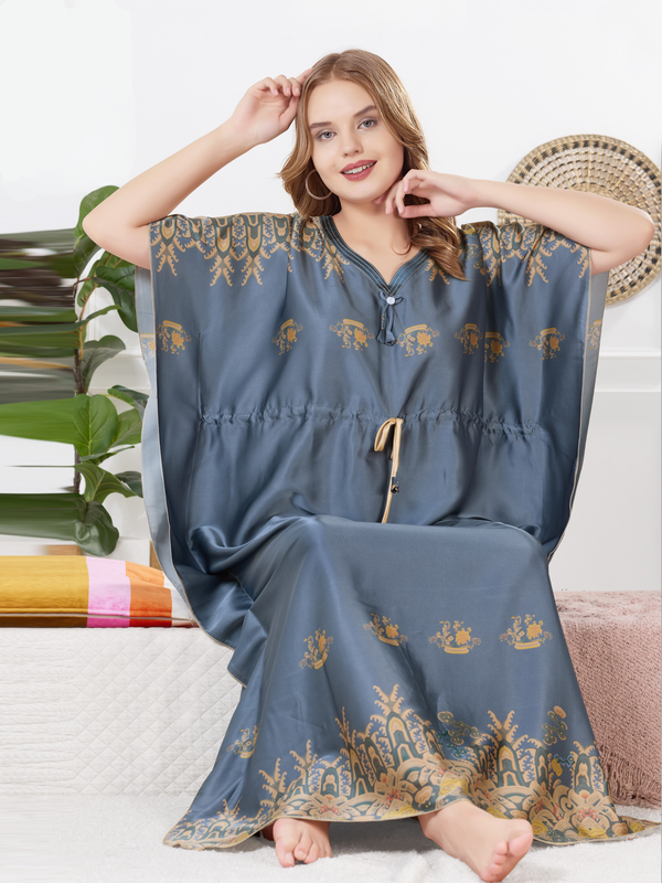 Slate blue satin kaftan for women with gold ethnic print, front view
