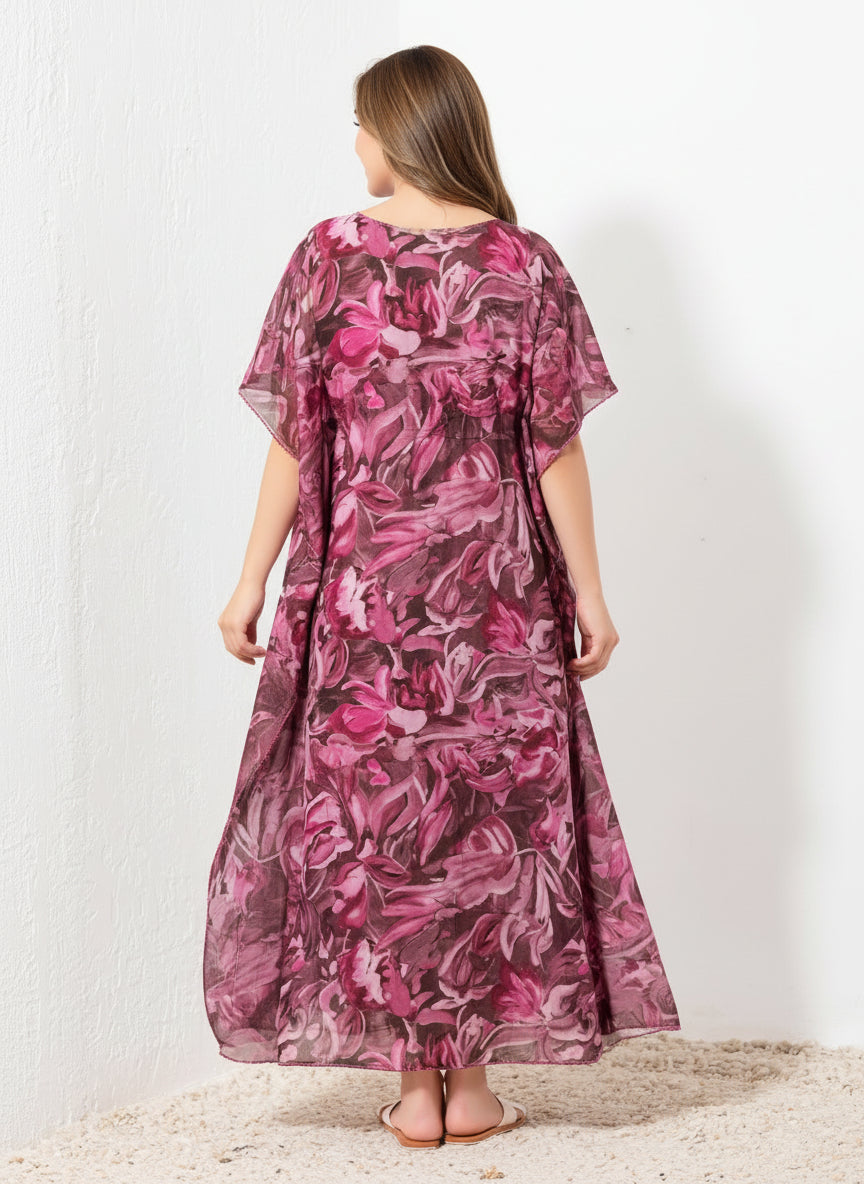Back view of pink and brown cotton abstract kaftan showing flowy full length fit and artistic pattern