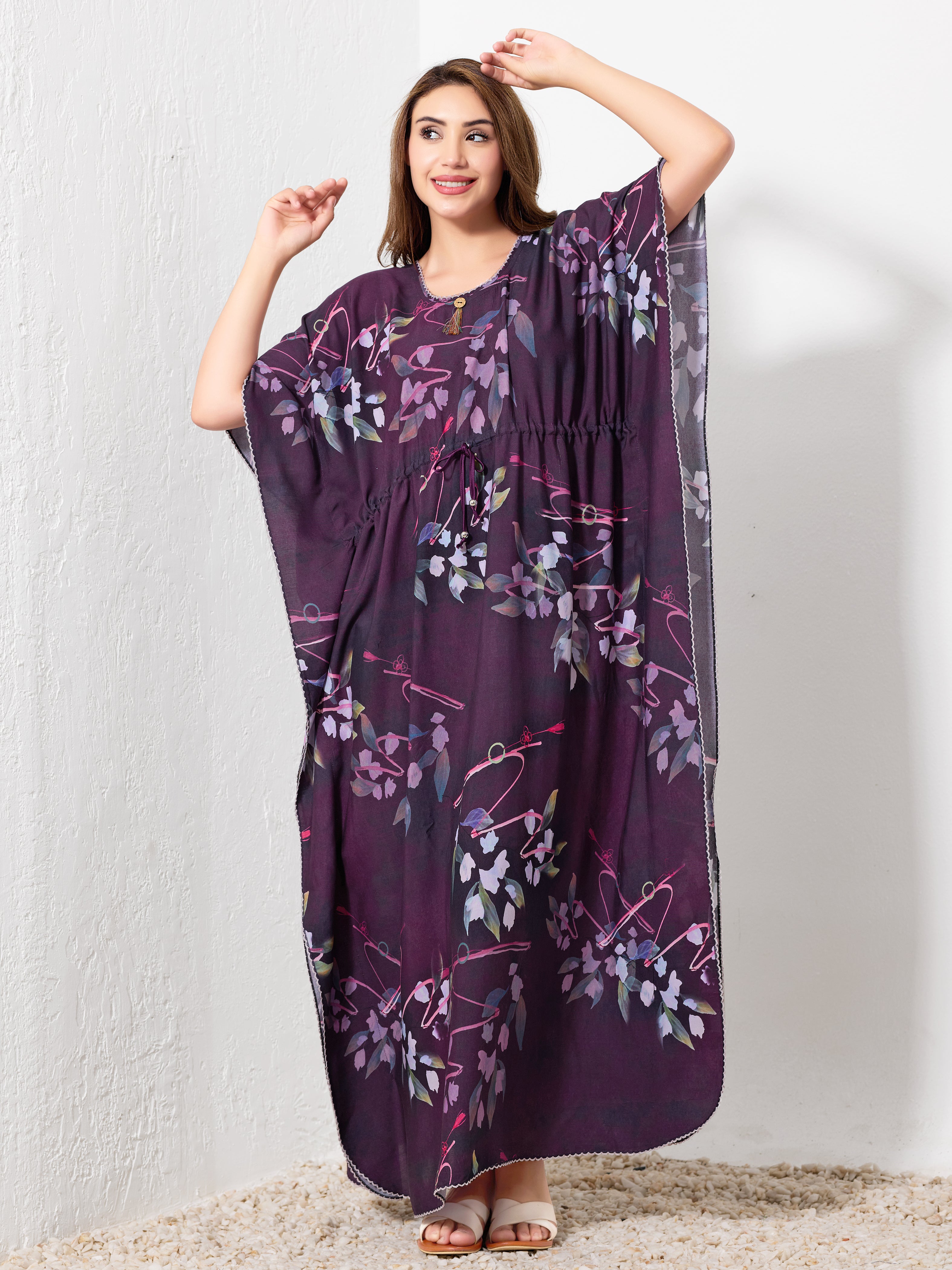 Back view of purple cotton floral kaftan showing flowy full length fit and drawstring details